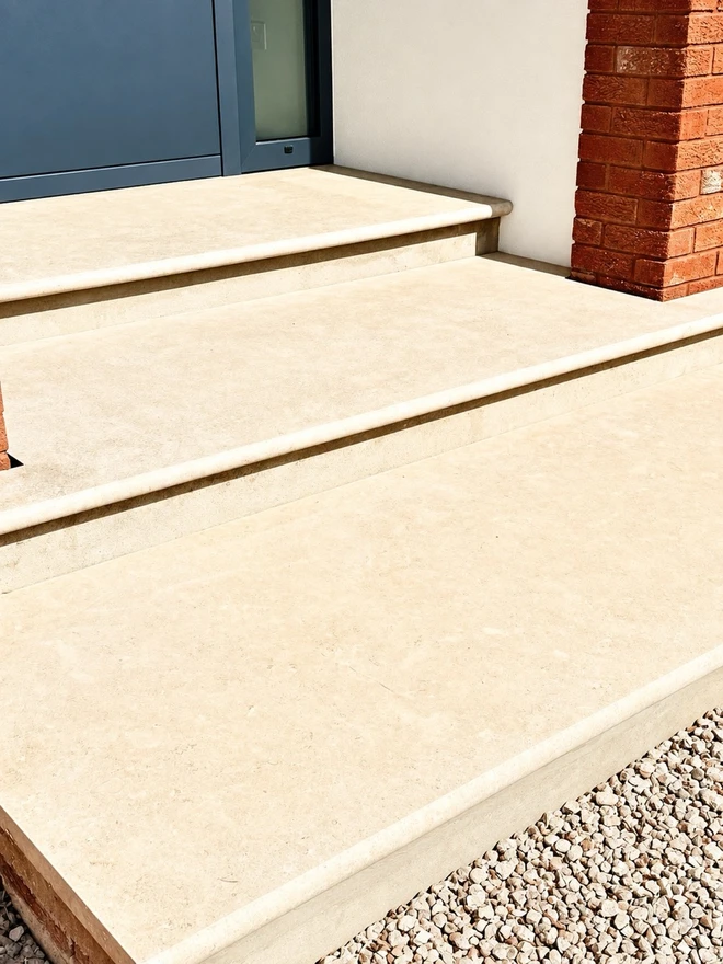 The finished limestone steps, with every riser laid to the same height.