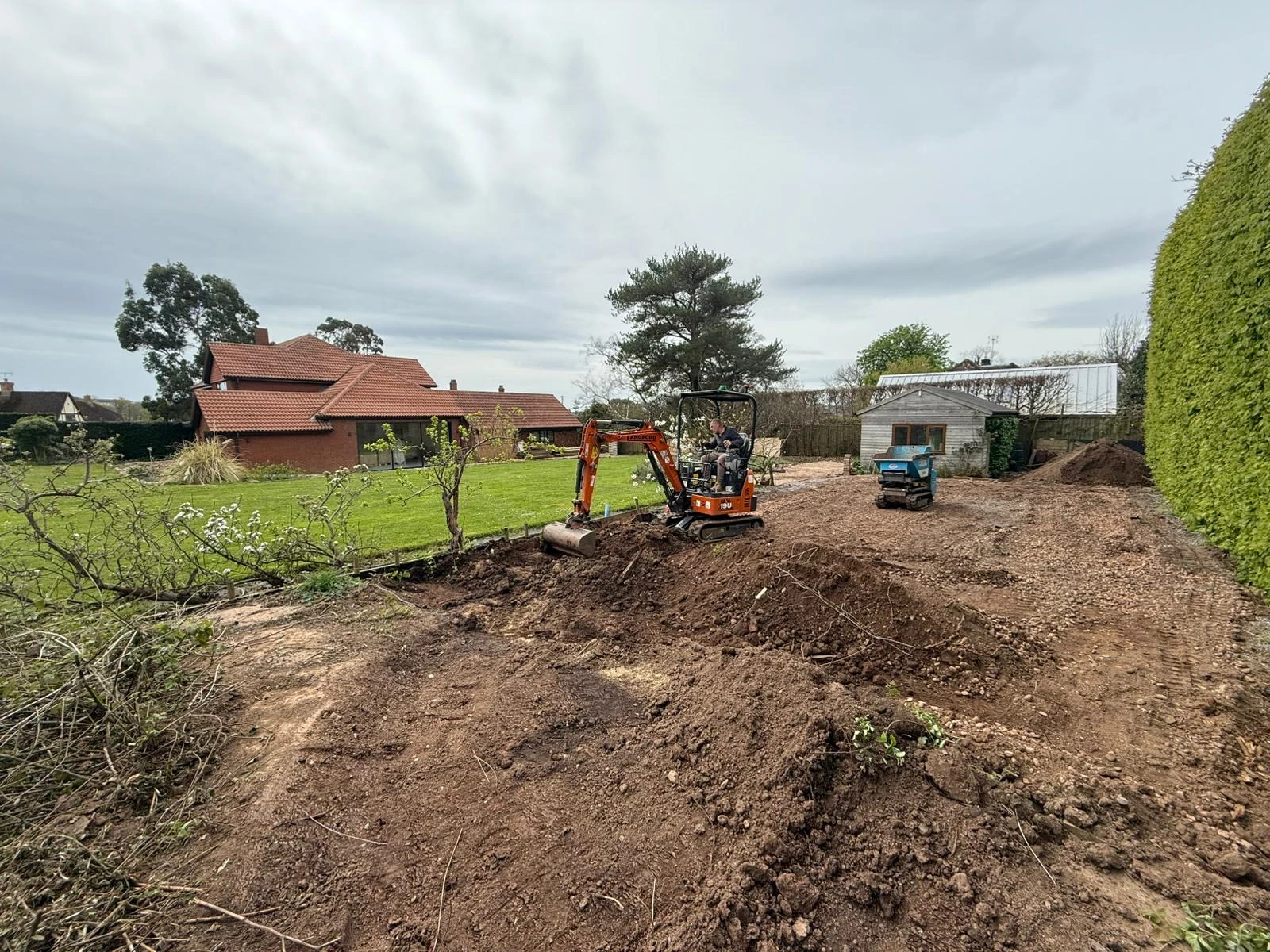 Excavating and levelling the ground before any stone went down